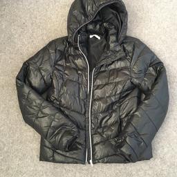 Black, shiny puffed jacket with detachable hood