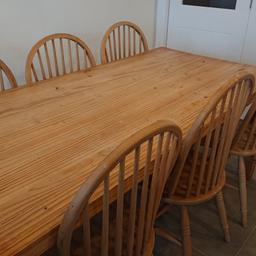 Solid wood dining table and 6 farmhouse chairs.

Table had small split that could be repaired with wood filler. Nice upcycle project. Very heavy.

Six solid wood farmhouse chairs included.

Table 183m L x 80cm W

Collection only.