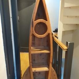 Solid wooden shelves in the shape of Rocket. Quirky piece of furniture in excellent condition. 
Height 1m 68cm
widest point at base 67cm.