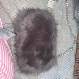 Grey fur style bag can be used as bag with chain or remove chain and use as clutch bag new with tag