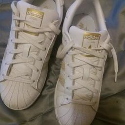 Adidas superstar La marque aux 3 banded trainers size 6 adults or junior. white in colour with gold stripes. only ever worn inside my house for a few hours only
