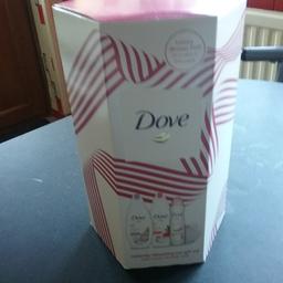 New unopened Dove luxury shower set includes shower puff 2body washes 1 deodorant pomegranate  and lemon  scent