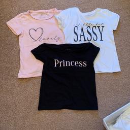 3 river island goes t shirts 
1 pink with black heart and says lovely
Plain white with black writing & says a little bit sassy and plain black with pink writing & says princess 
Size 18-24 months 
Have been worn but in good condition