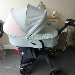 stokke v6 pushchair in pink and gray great condition been used only a few times but dose have some slight marks due to putting in and out of the car ect nothink noticeable and I believe once cleaned would come up brand new
this pushchair is over £1200 brand new 
carry cot
seat unit with new born insert
stokke bag
open to offers