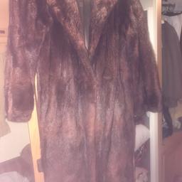 Size 10 
Fur coat