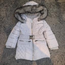 River island girls 9-12 months light grey coat, 
Removable fur around hood for wash, 
has been worn but in good condition.
