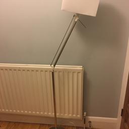 Floor standing lamp. Fill working order. Been used until now. Doesn’t have original circular shade. Replacement is geometric white box shade as seen here in photo.