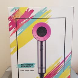 brand new hairdryer in elegant pink and metallic gray with nozzle attachments included.

collection preferred. offers welcome.