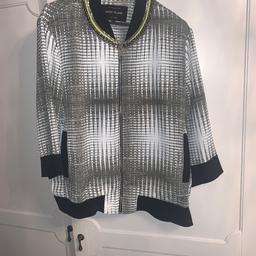 River island size 12 green style quarter sleeve jacket with zip and pockets. Detail round neck line