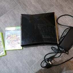 Xbox 360 S console. and 2 games. Please note there is no controller!! The console is in full working order.