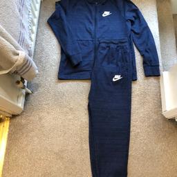 Nike Tech Full Tracksuit Blue Medium.

Top is Medium

Bottoms are Large

This tracksuit is more for a Medium fit

In great condition

PayPal Goods and services