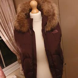 great condition, with removable fur, size medium, brown