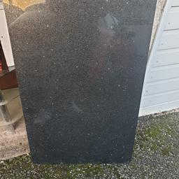 Black granit hearth for sale in excellent condition few small chips in the corner ( Really heavy) lengh 106 cm width 64 cm depth 2.5 cm collection only or can deliver locally.