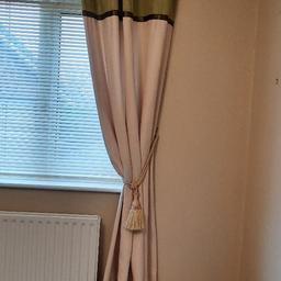 Pair of green/cream eyelet curtains with cream tie backs. 
54" wide x 90" drop.
Safe distanced collection Walmer Bridge PR4