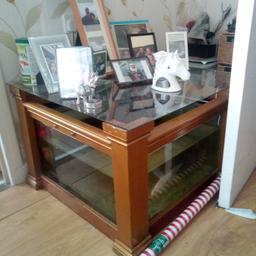 table is a fish tank with 3 large gold
fish selling with 3 large gold fish
£150 it's about 2 and half foot
my phone number is 07598142678