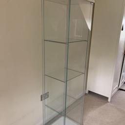 Ikea white glass display cabinet  dimensions are 425mm wide x 1625mm high x 365mm depth.  in very good condition with hardly any marks. I can deliver locally for £5 charge.
Cash on delivery or collection.