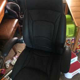 Computer chair. Presumably pleather.  My office sent me a chair where the arms tilt 45 degrees so selling this one.  Cost £80. Similar one is now £71.  Wiped it over with a spot of olive oil to show it at its best.  It is pretty new. Has 5 wheels and is not in anyway broken. Selling as need space.