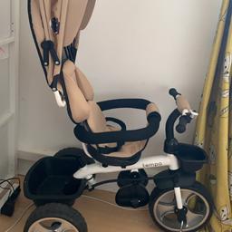 Unisex Beige Trike. 
 Used once. Handle to steer comes off. Trike goes Into 3 different styles as child grows. Foot rest for smaller kids use. Basket and small pouch as seen. Smoke and pet free home. 
Brought for £70 three months ago. 
Collection Dagenham East. 
OVNO .