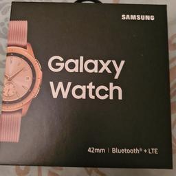 Samsung galaxy watch rose gold in eccellant condition still has protective strip on face. come boxed and with charger.