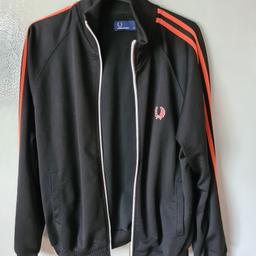 Lovely trackie top, black n orange. Mens 2008 vintage, fashionable, never goes out of fashion. Great condition, no pulls or marks.
other jackets, tee's and polo's for sale, message me for details. Check other ad's firstly.