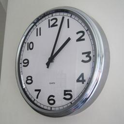 Ikea Wall clock chrome finish with duracell battery. Size W 31 x D 5 cms, see pictures for more details - Collect from Dukinfield SK16