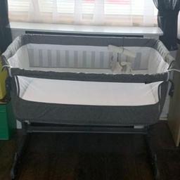 Babylo side sleeper grey colored cot with white mattress that is sutible from birth to 9 kilograms, size 49/88cm In perfect condition, no offers available and pickups only, thankyou.