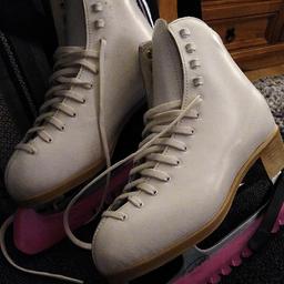 excellent condition, white ice-skates, size 5 , with carrying bag. collection only.