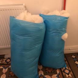 Two bags of stuffing for toys , pillows, furniture.
