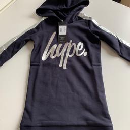 Brand new and unused.
Wrong size, too late to return thus selling.

HYPE jumper dress with hood.
Age 3-4 years.
Navy and silver.

From a smoke and pet free home.