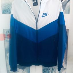 As seen, lads Nike windbreaker jacket. Been worn but Perfect condition no wear unmarked. XL to fit 14/15 yrs