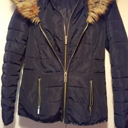 Black coat by miss selfridge coat with fur trim removeable. Very warm coat