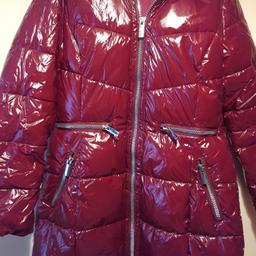 burgundy wet look shiny coat by Very. 
fur trim hood removeabl. 
Very warm coat. VGC