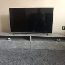 Beautiful Media Unit in Grey.
Slight damage to both rear corners(see photos).Hardly noticeable once hung on the wall or can sit on any floor.
Cost new £185.

Dimensions:

W:180cm.
H:31cm.
D:31cm.