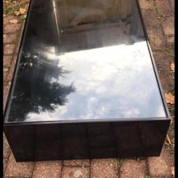 Dwell glass table no need for it, very heavy nice coffee table