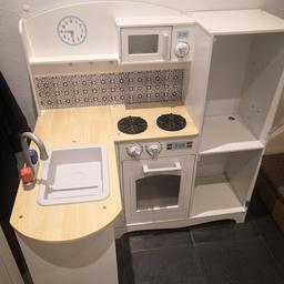 Childs large kitchen needs the door fixing back on comes with a plastic dishwasher and plastic food and some metal pots needs picking up ASAP by asda utting Ave walton L4 open to offers