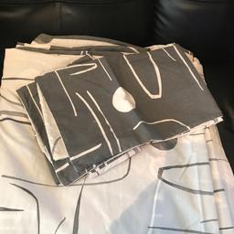 Grey and White reversible patterned duvet and 2 pillowcases. £18 dunelm