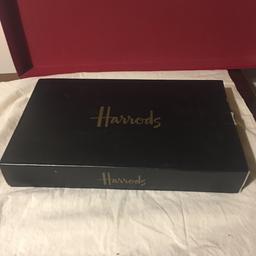 New, never been used, a stunning Harrods shinny and elegantly designed box of a backgammon game.
Not only does the board comes with an exquisite polish but but a smooth playing surface. It includes all its pieces.

PAYMENTS ONLY VIA SHPOCK WALLET OR CASH ON COLLECTION