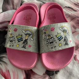 Kids sliders with elasticated strap fastening 
Younger Kids size 7 
£2 can post for extra