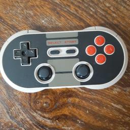 classic nintendo retro style bluetooth controller.
no cable for charging tho its just a simple phone charger (type c)
