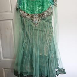 Mint Anarkali Asian Dress. Used twice but excellent condition. Gorgeous beads and diamond filled neck. Long churidaar sleeves. With churidaar trouser and dupatta. good fit for size 10-12

￼