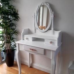 This has been beautifully restored like new in a modern white satin finish. Lovely solid piece of furniture, new handles 1 rose gold, 2 in white and rose gold finish to them. Featuring three lined drawers and shelving space, this dressing table has ample storage for all your daily essentials. No stool available sorry, please check out my other items. Pay on collection preferred please.
 Original price £159. Thank you x

H 145cm x W 76cm x D 40cm