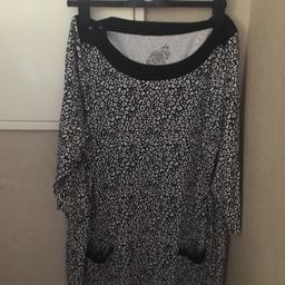 Ladies black top with pockets size large in good condition