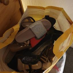 Three small bags of ladies shoes size 7/8 few ladies and mens clothes. free to collector. First come first serve.