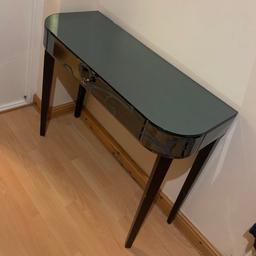 excellent condition glass dressing table black
very beautiful 
pictures not showing its beauty 
FREE LOCAL DELIVERY 
£60 including delivery 
BARGAIN