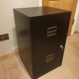 Black Filing cabinet. Excellent condition

2 drawers
400mm Deep
410 mm wide
670mm high

Included:
50 document file holders
2 keys

Not on wheels but not heavy. 

Collection only please.
If you live near SW19 we might be able to come to an arrangement for delivery