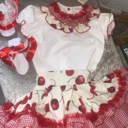 Hand made set brand new size 18m with matching bow and socks had this made for my girl but she don’t suit it