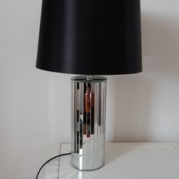 Mirrored lamp base with black lampshade,
height of lamp to top of shade is 47cms,
only put bulb in to show it's in perfect working order but bulb not included, never used as been in spare room so in immaculate clean condition, good quality lamp