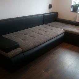 Universal Corner Sofa Bed with Storage in Gray Black. Sofa is a good used condition.