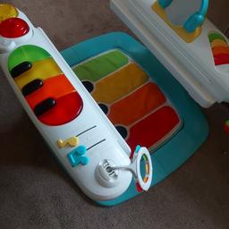 Fisher price 4 in 1 step and play activity centre 
has seat for younger baby, can be remover for standing child 
has a step on piano to use which can be taken of washed 
lots of activities for the little one to do and last a good age span 
a big piece of toy 
Good condition