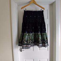 Skirt “Dorothy Perkins” Black Green Mix Colour
New With Tags

Actual Size: cm

Length: 68 cm

Length: 67 cm side

Volume Waist: 70 cm – 72 cm

Volume Hips: 83 cm – 84 cm

Size: 10 (UK) Eur 38

Outer: 100 % Cotton

Lining: 65 % Polyester
 35 % Cotton

Made in Romania

Retail Price £ 28.00 ,
44.00 € (Eur) IRL